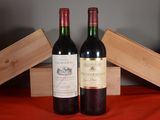 deux bouteilles de vin posées l'une à côté de l'autre sur une table