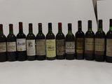 many bottles of wine lined up on the counter