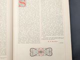 an open book with a drawing of a butterfly on it