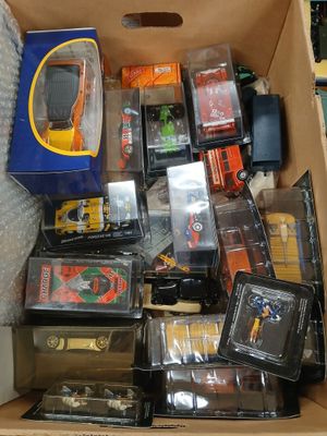 a box full of toys and other items in it
