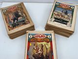 three vintage children ' s books are sitting on a white surface