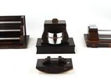 four different types of coffee grinders on a table