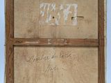 an old wooden box with writing on it sitting on top of a table
