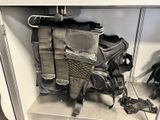 an image of a backpack and a pair of shoes in a closet
