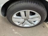 a close up of a tire on a car ' s rim