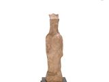 an image of a statue of a woman standing on a wooden base