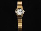 an image of a gold wrist watch with roman numerals on it
