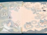 an open book with a picture of a map on it
