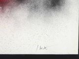 an image of a black and white painting with red paint on it