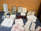 a table with a bunch of napkins and other items on it