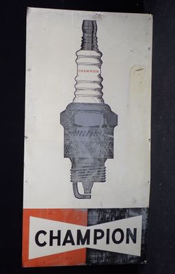 un panneau sur lequel figure l'image d'une bougie d'allumage