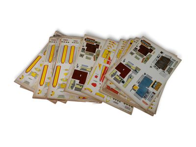 several pieces of paper with different designs on them on a white surface
