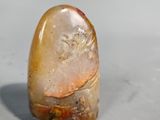a close up of a rock with a small piece of rock in it