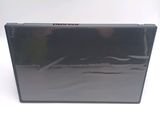 a black laptop sitting on top of a white table