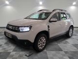 a picture of a white dacia parked on a checkered floor