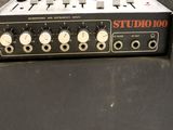 a close up of a sound board in a recording studio