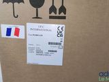 a cardboard box with a picture of a wine glass and umbrellas on it