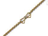 a gold bracelet with a bow and diamonds on it