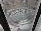 an open refrigerator with a lot of food inside of it
