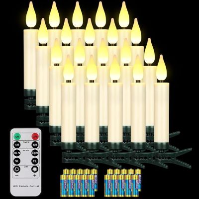 a lot of candles that are lit up with a remote control