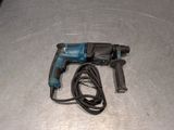 a drill that is sitting on a table