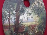 une photo d'un tableau sur un fond rouge