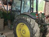 a tractor that is parked inside of a building