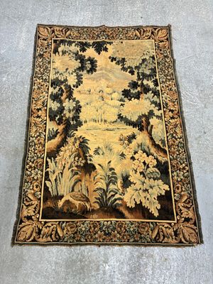 une photo d'un tapis sur lequel est représenté un paysage