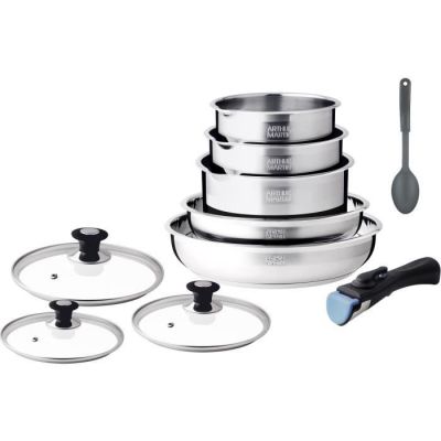 several stainless steel pots and pans with lids and spoons