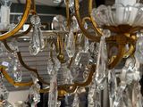 a chandelier hanging from the ceiling in a store