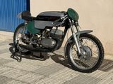 a motorcycle that is parked on the side of the street
