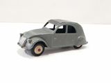 a toy car that is sitting on a white surface