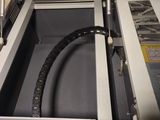 a machine that has a hose in the middle of it