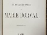 an open book with a black and white image of the title of a novel