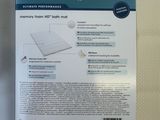 a picture of a box of microdrye mattress pads
