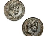 deux pièces d'argent sur lesquelles figure le visage d'une femme