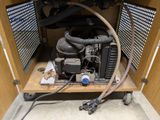 a machine that is sitting inside of a cabinet