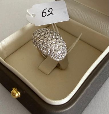 a ring in a box with a price tag on it