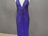 a purple evening gown on a mannequin mannequin mannequin mannequin mannequin mannequin mannequin mannequin manne