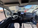a view of the inside of a vehicle from the driver ' s seat