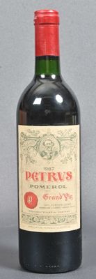 a bottle of wine that is sitting on a table