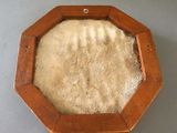 a picture of a wooden frame with a sheep ' s wool in it