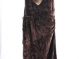an image of a dress on a mannequin stand in a room