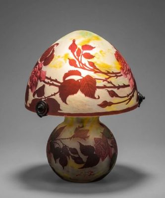 an image of a lamp with a flower design on it
