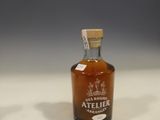 a bottle of alcohol that is sitting on a table