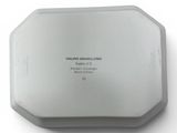 a white box with a black label on it on a white surface