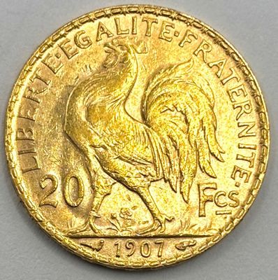 an image of a close up of a coin with a rooster on it