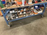 a workbench with many tools on it in a garage