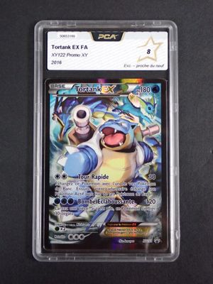 a close up of a pokemon card in a plastic case