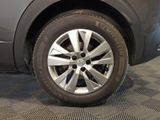 a close up view of a tire on a vehicle